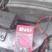 How to check a car battery with a multimeter and load tester